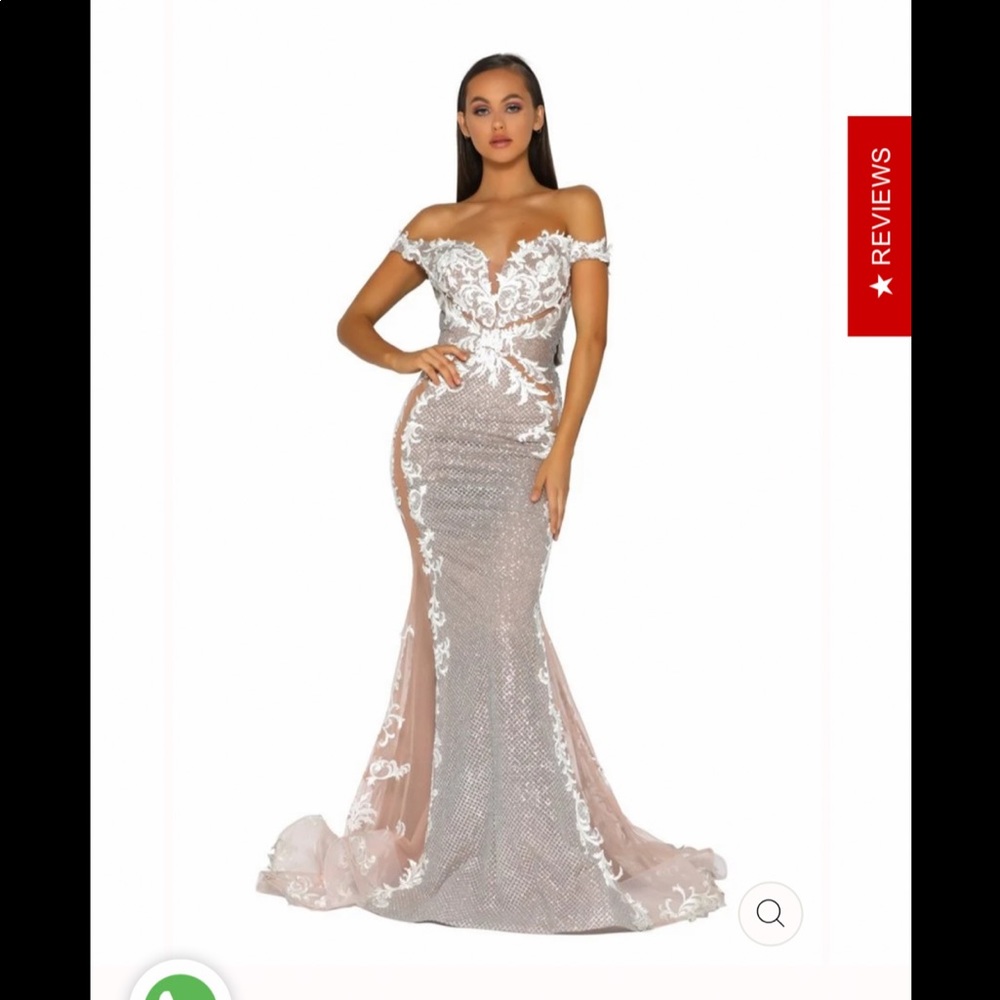 Beautiful Portia & Scarlett gown with tail that opens up to surround floor